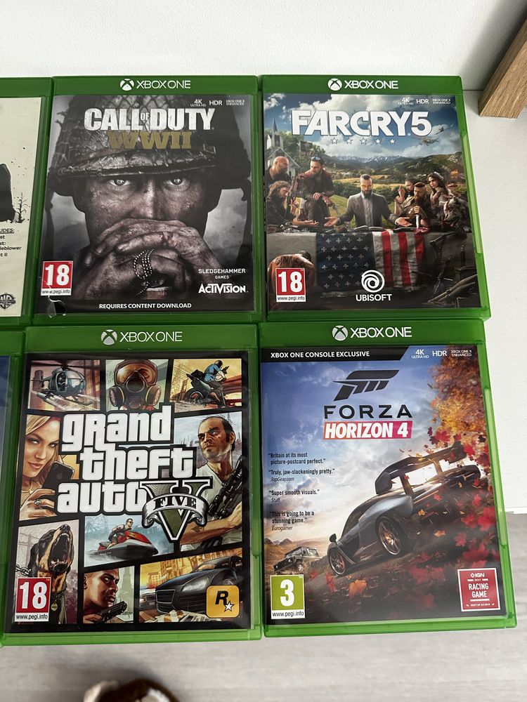 Xbox one X 1 TB + 2 controllere + 8 jocuri