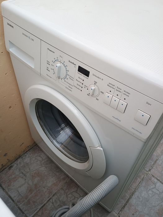 Mașină de spălat Candy OWX