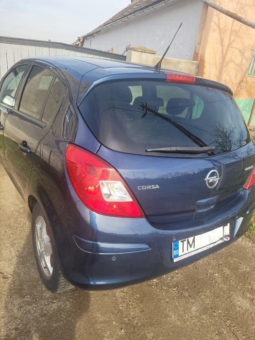 Opel corsa 2011 pret 2500E