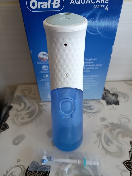 Irigator bucal ORAL-B Aquacare 4, 2 viteze, 2 capete, 150ml ca nou