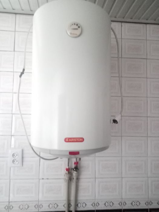 Продам  100 литровый Аристон + новый тен