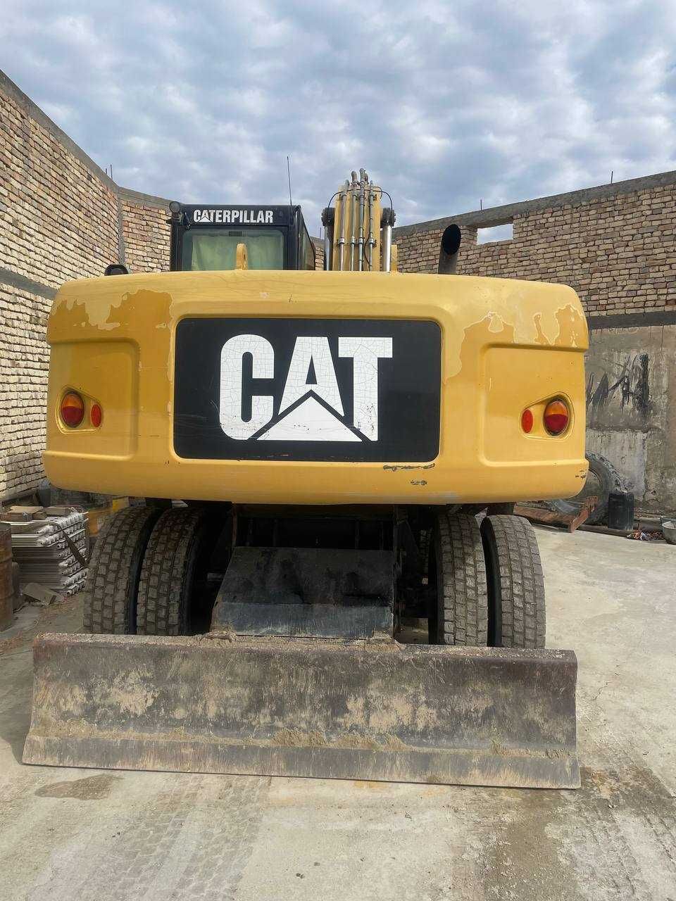 Колесный экскаватор CAT M318D