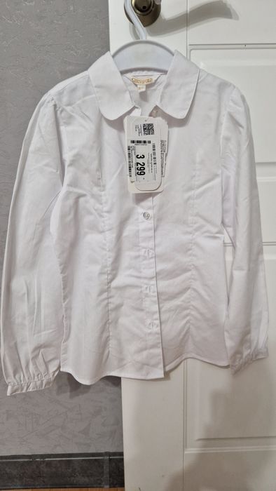 Продам новую школьную рубашку для девочки 122 см