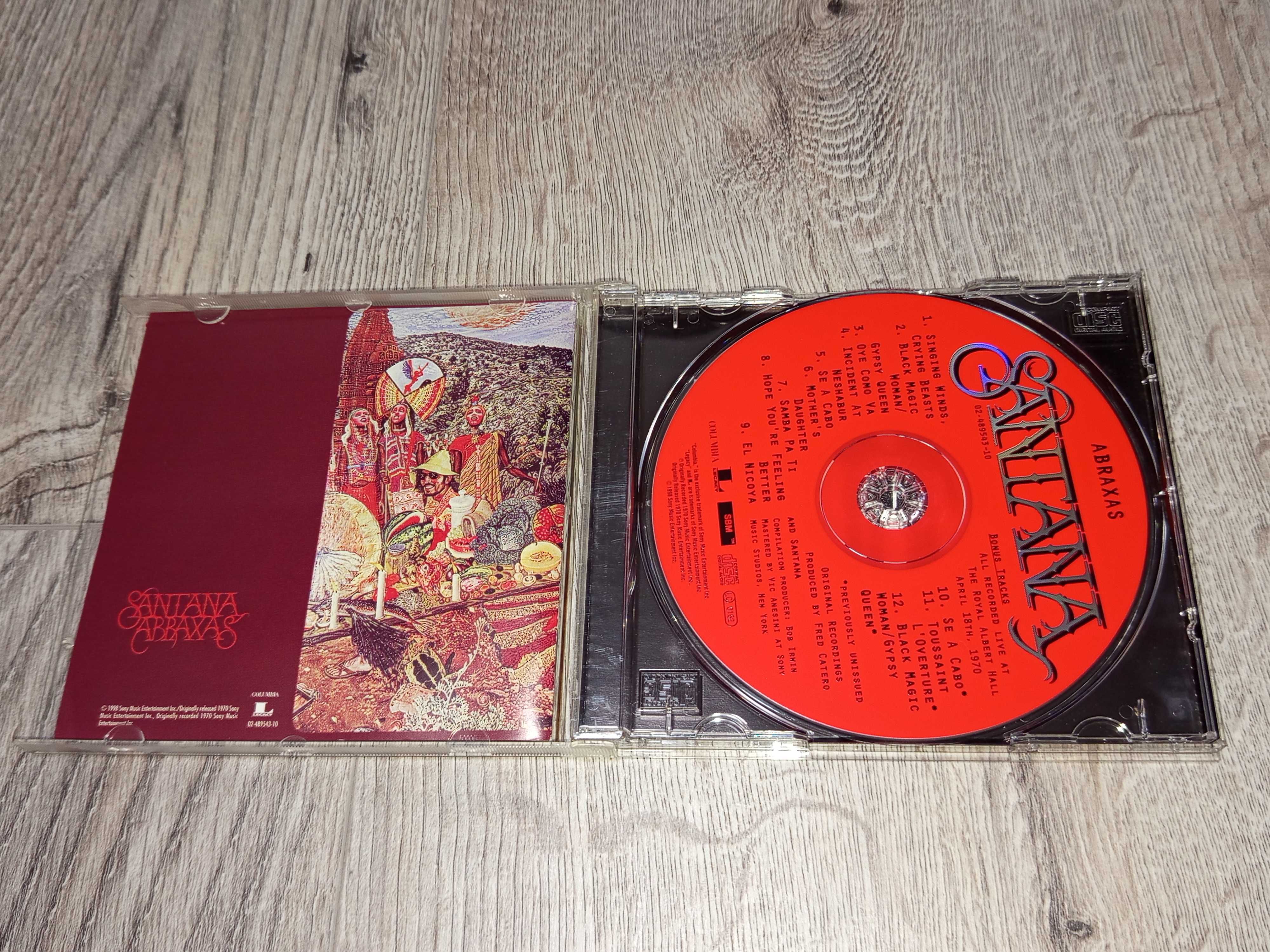 Компакт дискове Santana, Talking Heads, Billy Joel