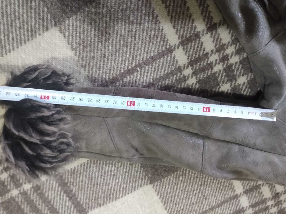 Детски кожух от естествена кожа за момиче .