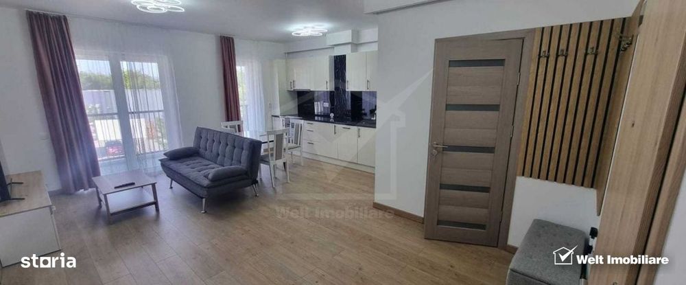 Apartament 2 camere  balcon si parcare , la intrare in Floresti