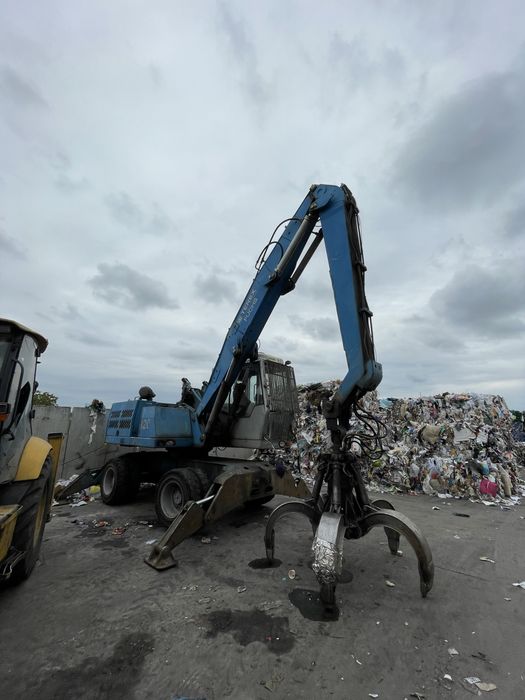 Fuchs MHL 320 excavator graifer - schimb auto/ teren