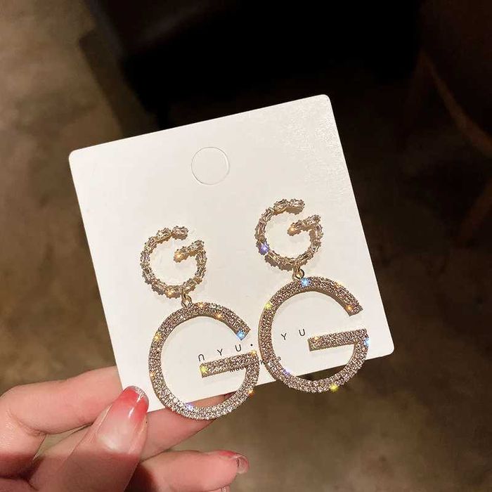 Уникални обици Dior