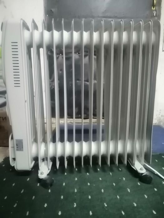 Масляный обогреватель