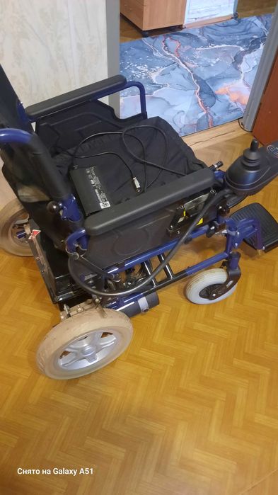автоматическая коляска для инвалидов