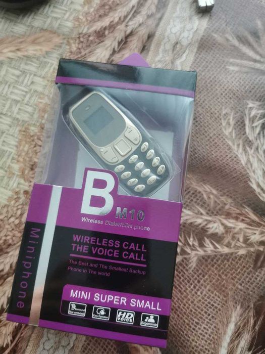 Telefon mobil mini BM10 dual sim OLED apelare,agenda telefonica SMS