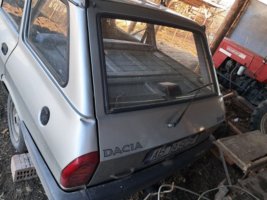 Vând Dacia Break.