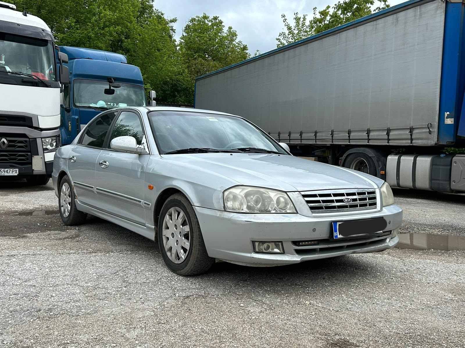 Кия мажентис 2001