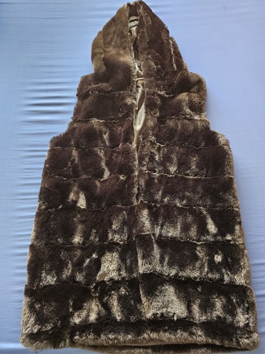 Vesta blanita sintetica
