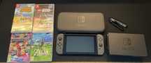 Продавам Nintendo Switch в отлично състояние + 4 игри