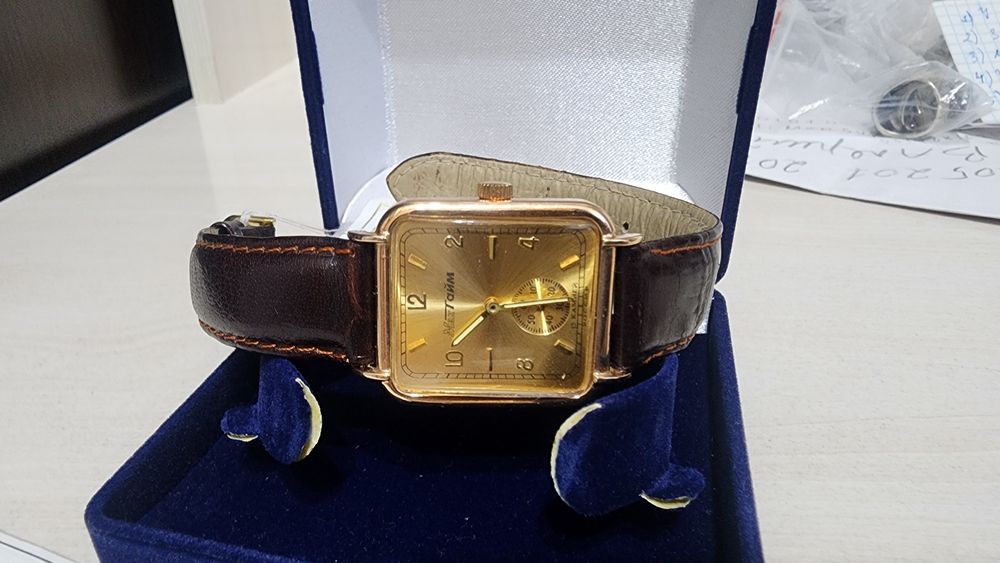 Золотые часы.с паспортом.