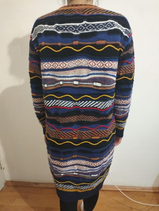 Bluză de corp Ortovox și rochie Moschino