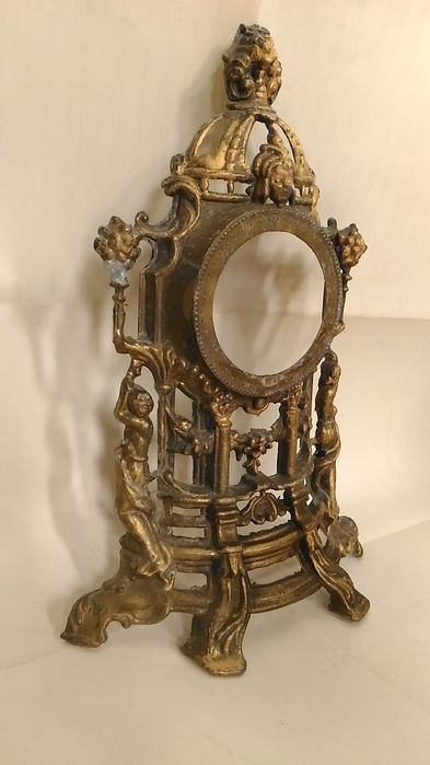 Ceas de semineu. Masca bronz