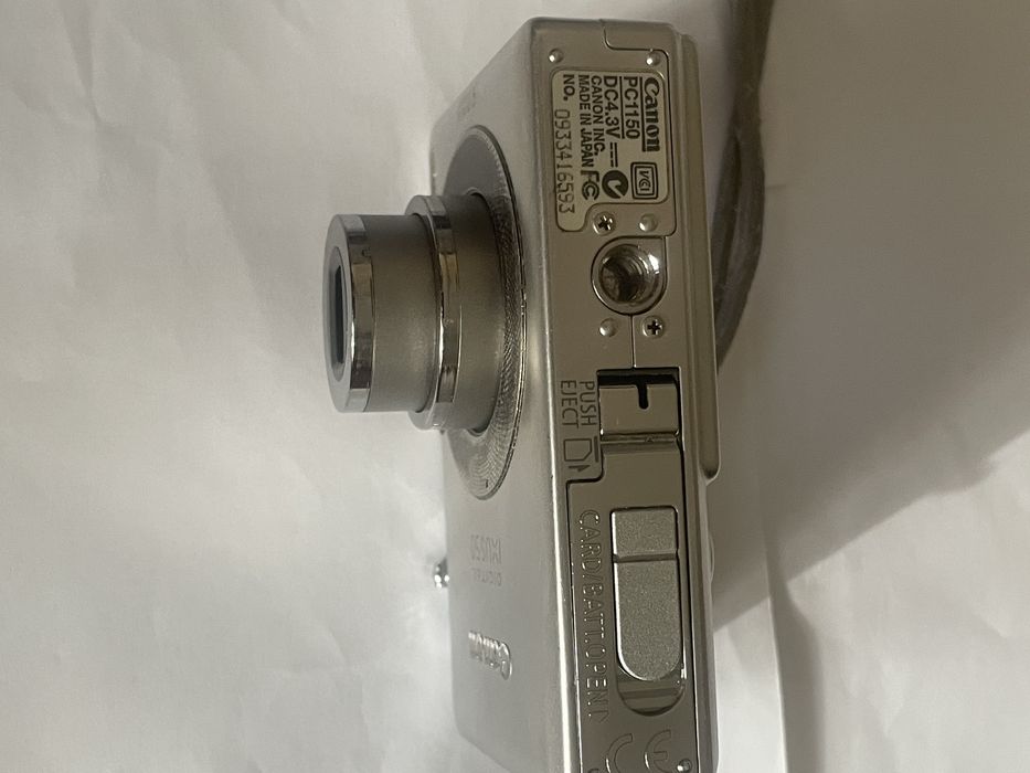 Canon Ixus 50 ,metal , made in Japan, afisaj data ora pe poze