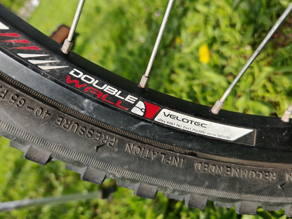 Bicicletă MTB 24", cadru aluminiu, frâne hidraulice pe disc