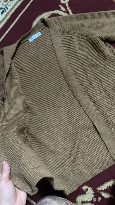 Вязание кардиган коричневого цвета с карманами