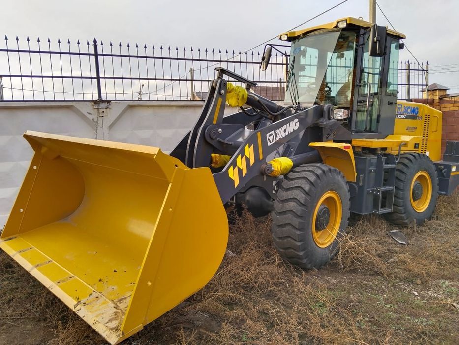 Аренда фронтальный погрузчик, трактор