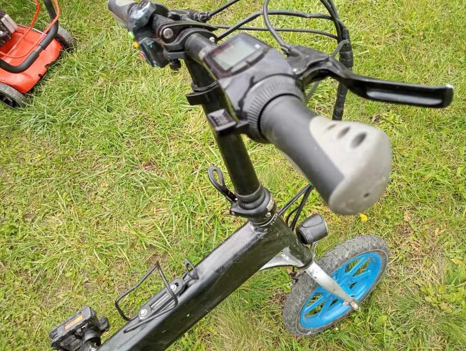 Bicicleta electrica cu propulsie si asitata