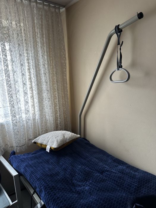 Pat electric cu telecomanda pt persoane cu dizabilitati.