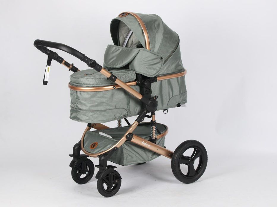 Коляска-люлька с поворотными колёсами и амортизацией (Belcoo)