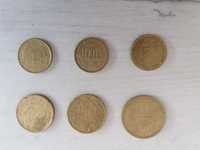 Monede de 50 euro cenți, 20 euro cenți și 10 euro cenți.