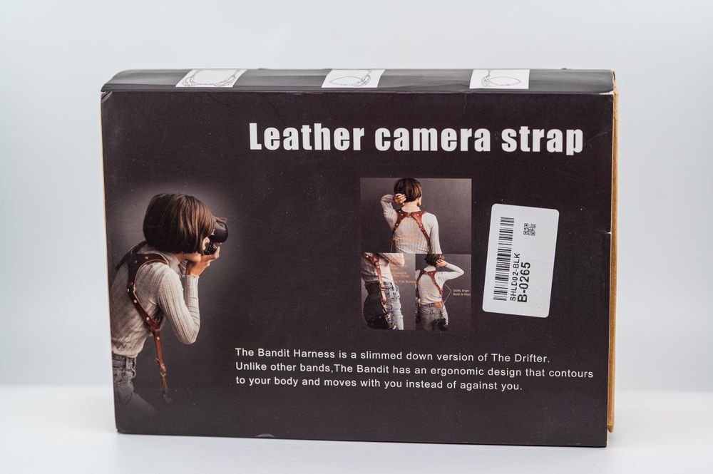 Кожен колан за два фотоапарата