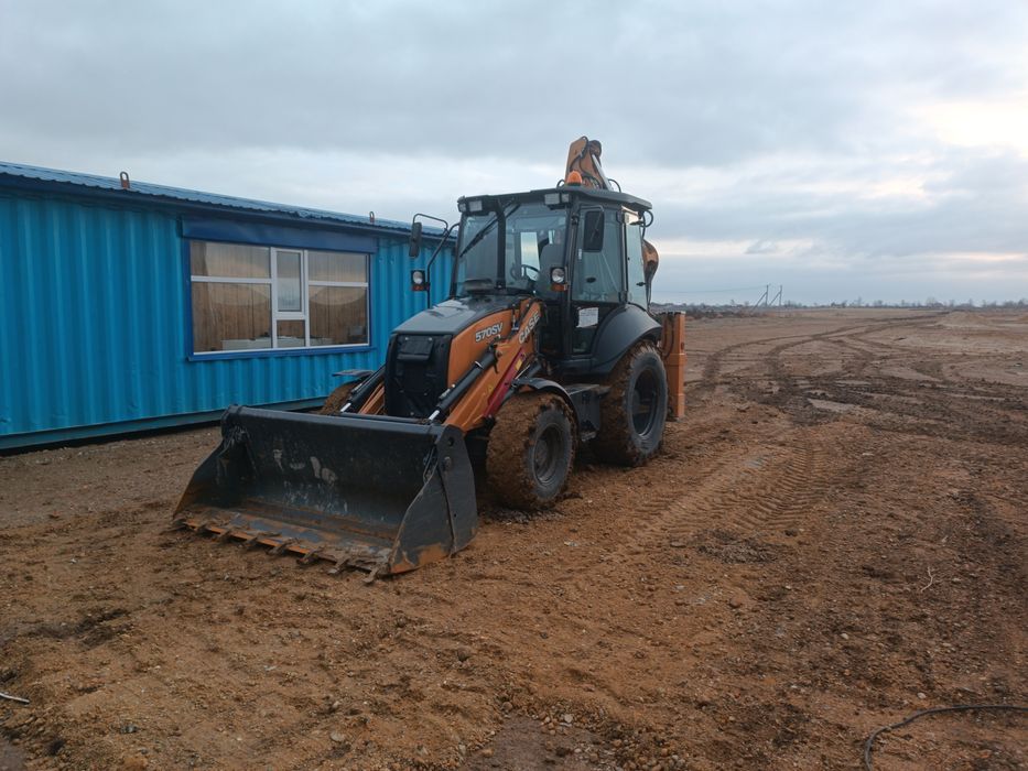 Услуги экскаватора- погрузчика