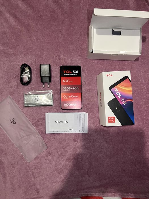 Vând telefon nou TCL 501