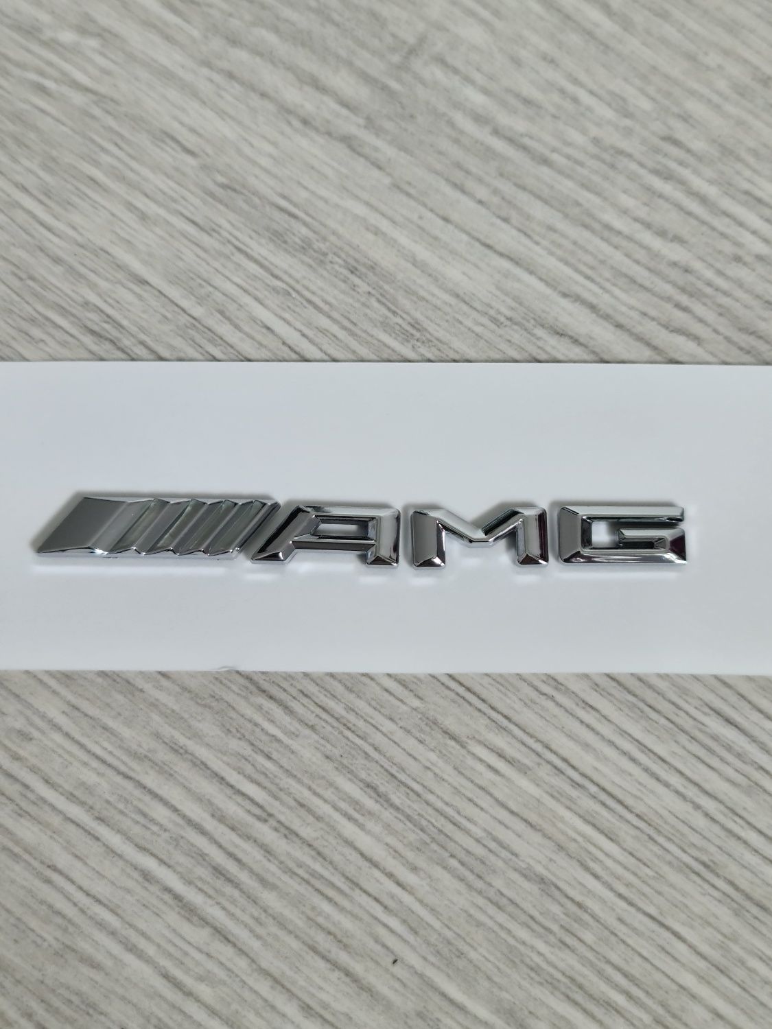 Emblema-Sigla-Logo-AMG-Consola-Mercedes-C-E-S-Class-CLS-GLE-CLA-4Matic