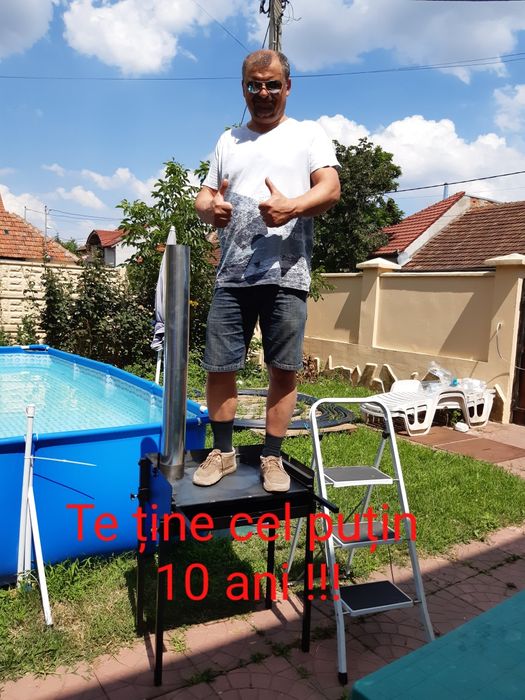 Fantasticul grătar cu plită și burlan! Grill/extensie ceaun opționale.