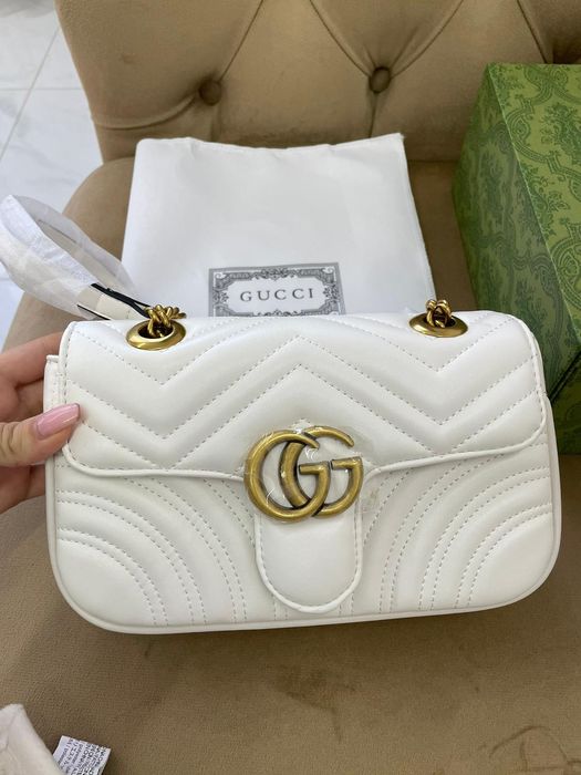 Geanta GG in cutie și săculeț