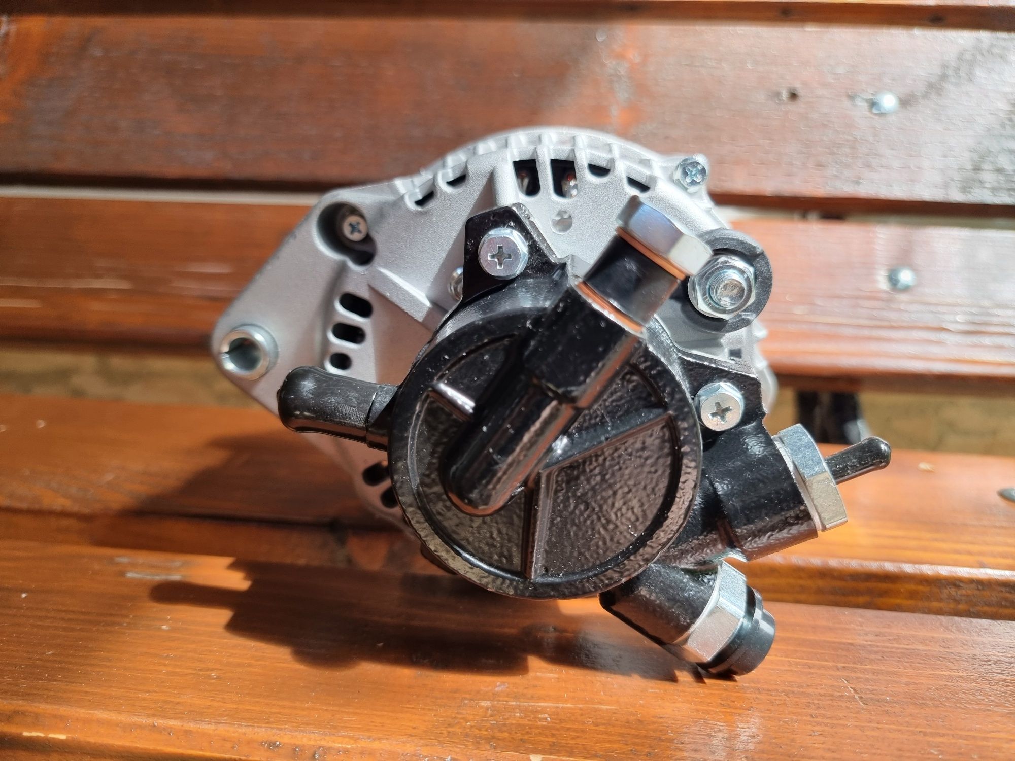 Alternator NOU cu pompa vacuum Opel Astra H 1.7 CDTI Z17DTL Z17DTH