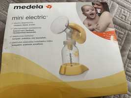 Молокоотсос Medela mini electric