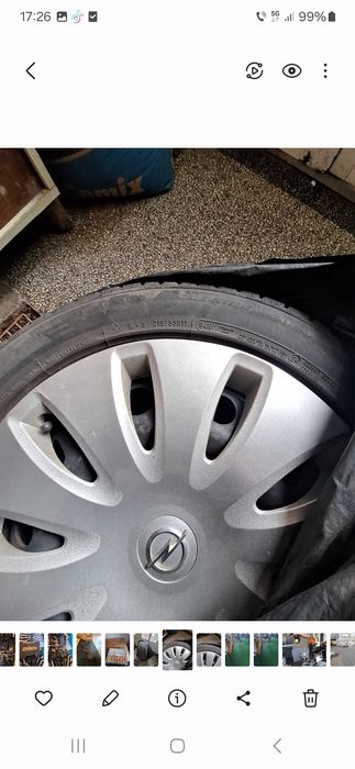 Jenti pentru Opel din tabla + cauciucuri de iarna + capace originale