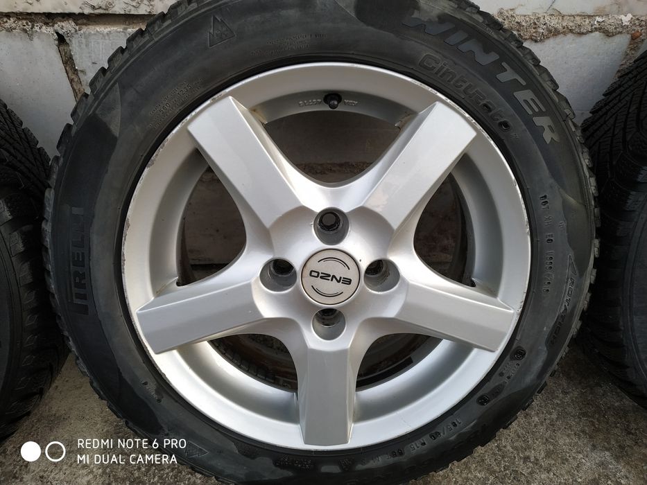 4броя лети джанти с зимни гуми Пирели петнадесет цола 4болта на 100 ми
