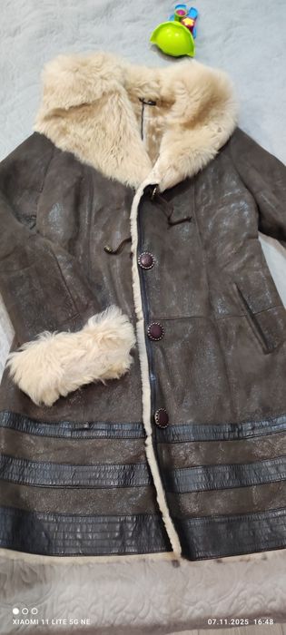 Женская дубленка