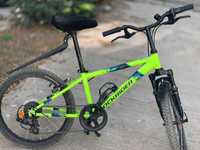 Oferta: Bicicleta RockRider ST 500, accesorii multiple, copii 9-12 ani
