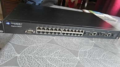 26 портов 24 + 2 gb managed switch Foundry networks EdgeIron 2402CF