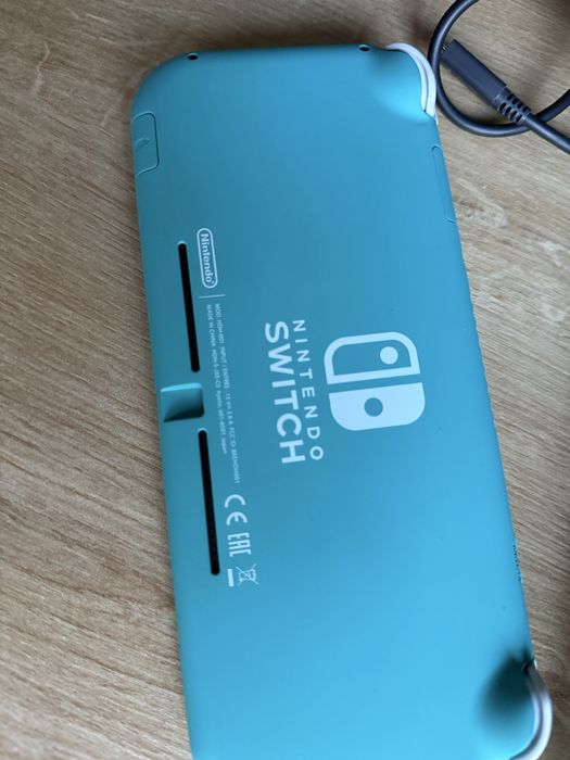 Consolă Nintendo Switch Lite ca nou cu încărcător și husa originala