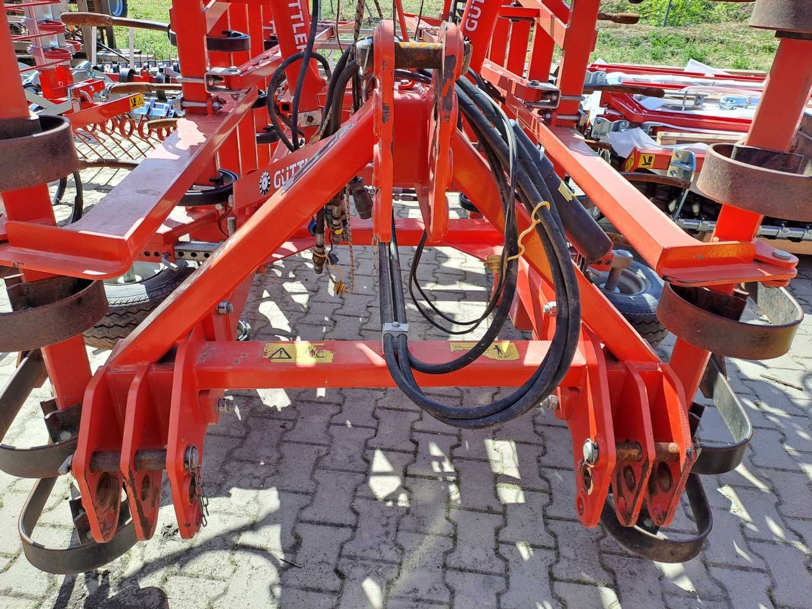 Cultivator Güttler SuperMaxx 50 BIO cu tăvălug și nivelator (folosit)