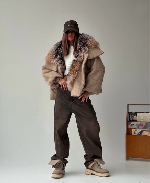 Продам пуховик меховой