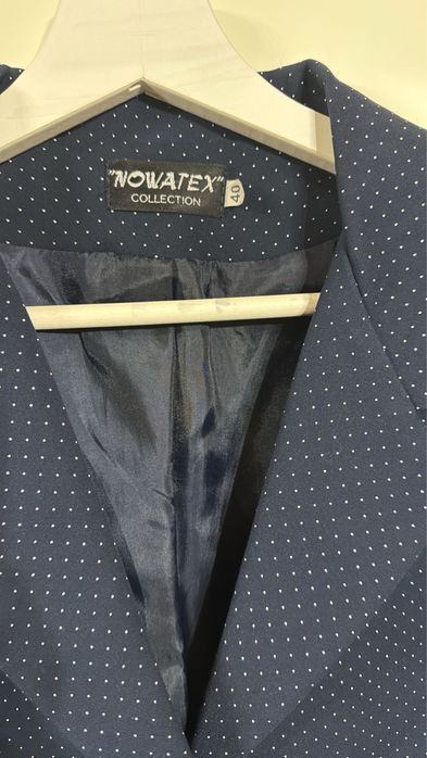 Costum Novatex nou fara eticheta