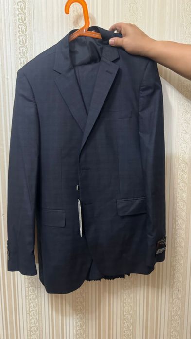 Продам мужской костюм новый