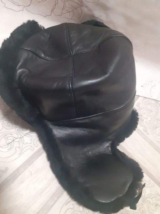 Продам шапку ушанку 58 размер новый