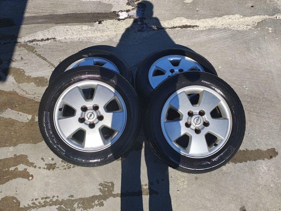 Vând jante Opel Astra G r15 6Jx15H2 ET 49 + cauciucuri all season
